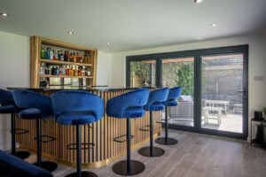 Aluminium bi-folding doors garden room