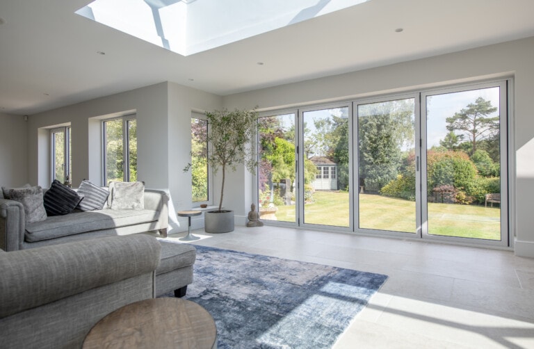 Bright open living room with double glazed aluminium windows
